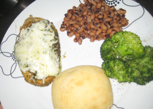 Pesto Chicken served with black eyed peas, fresh steamed broccoli, and ciabatta roll